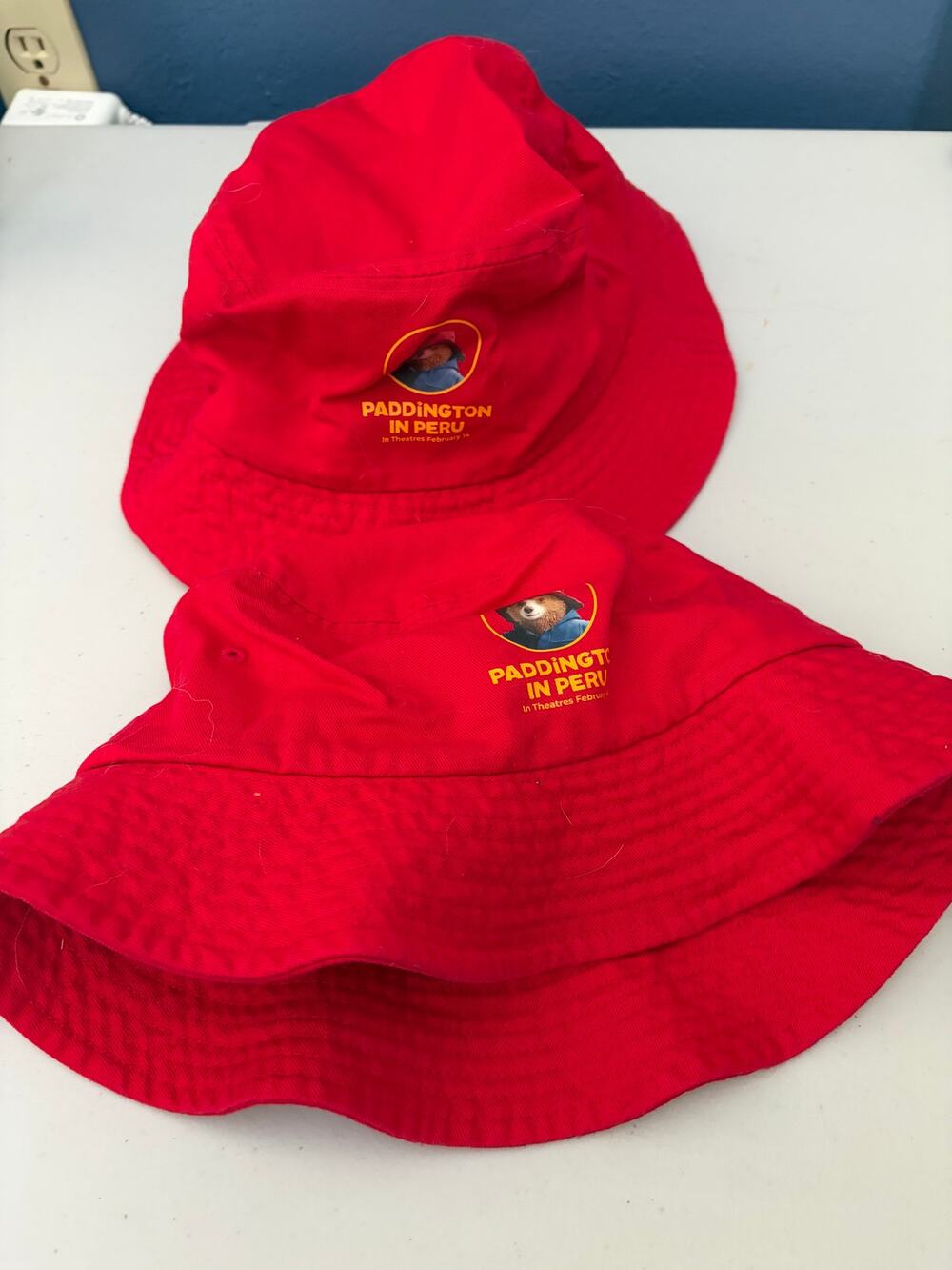 Paddington in Peru Movie Promo Red Bucket Hats Size L Set of 2 New Limited Ed.